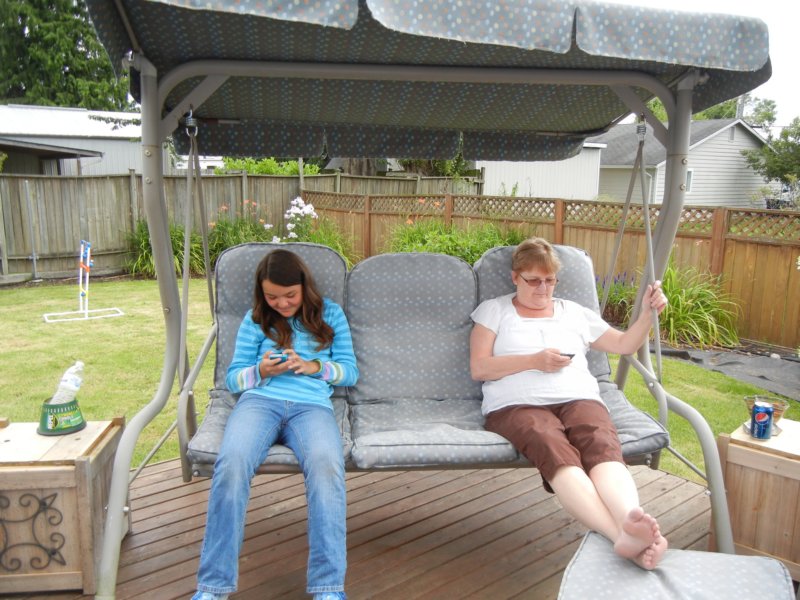 erinandcherylcheckingtheirphones.jpg