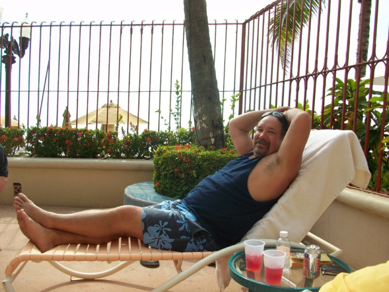patbradyrelaxinginmexicoontheircondominiumpatio.jpg