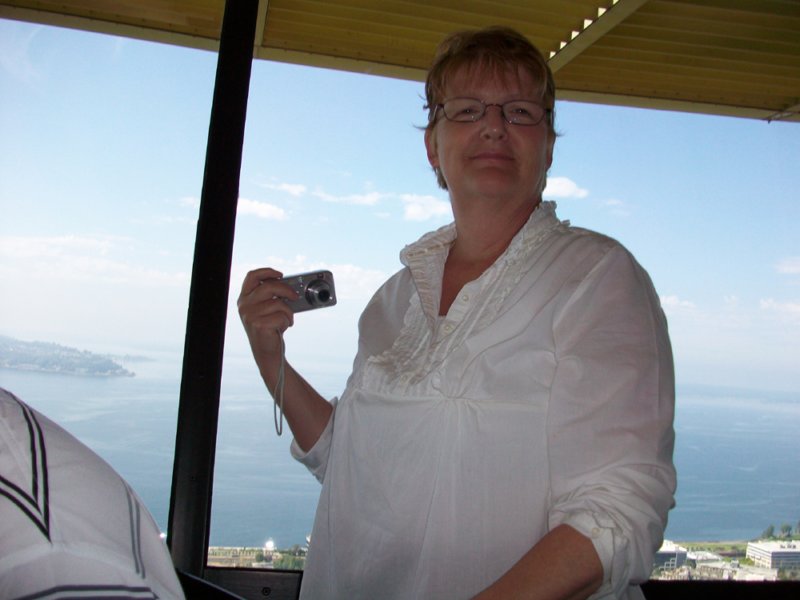 cheryltakingpicturesattheskycafatthespaceneedle.jpg